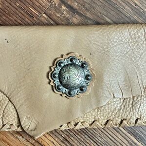 Tan Leather Clutch with Silver Accent. 100% Cowhide, very soft.